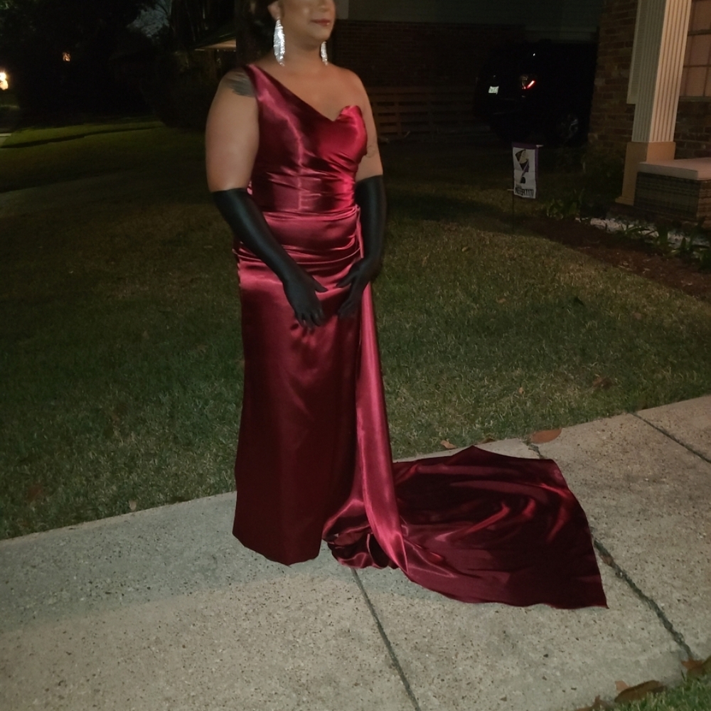 2 Beautiful Dresses size 14. 1 is Red the other is Dark Red